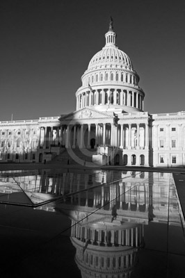 HD_SL-17 - The East Front of the U.S. Capitol Building in Washington, D.C. reflected in the roof glass of the underground visitor's center.