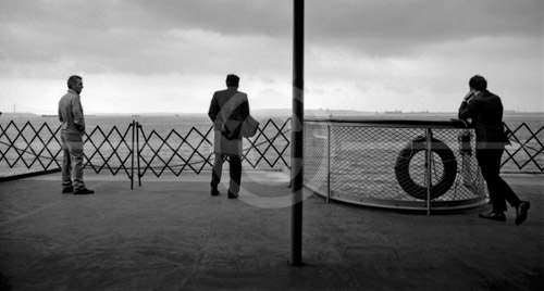 HD_P-33 - Three passenger at stern of Staten Island Ferry in New York Harbor.