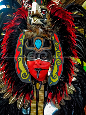 HD_P-42 - Closeup of local Cancun resident posing as a Mayan warrior in full costume at central market.