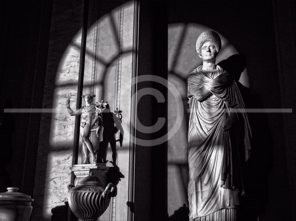 HD_STBW-90 - Statues lit by the early morning sun coming in the window of the Vatican Museum in Rome, Italy