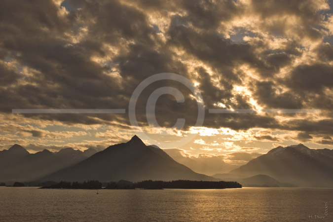 HD_STC-12 - Sunrise at enterance to Sitka Sound, southeast Alaska, from our cabin balcony of the MS Oosterdam. HD_STC-12 - Sunrise at enterance to Sitka Sound, southeast Alaska, from our cabin balcony of the MS Oosterdam.