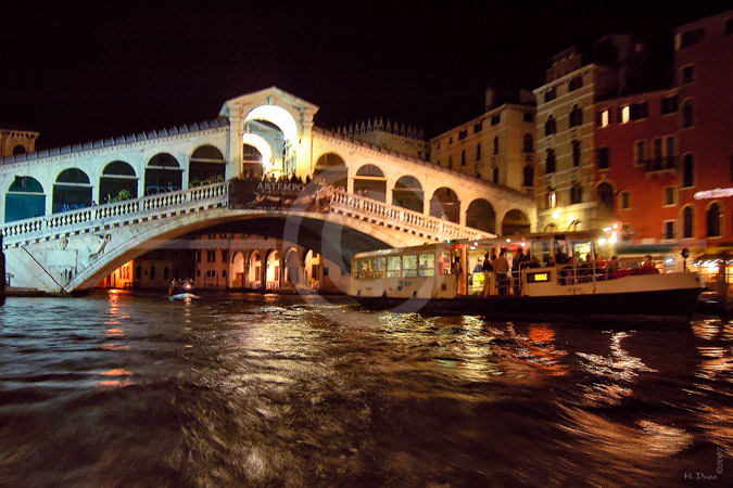 HD_STC-16 - The Rialto Bridge, crossing the Grand Canal at night, as seen from water taxi. HD_STC-16 - The Rialto Bridge, crossing the Grand Canal at night, as seen from water taxi.