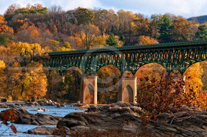 HD_STC-20 - U.S. 340 Bridge crossing the Potomac River near Harpers Ferry West Virginia. The bright colors of Fall surround the bridge. HD_STC-20 - U.S. 340 Bridge crossing the Potomac River near Harpers Ferry West Virginia. The bright colors of Fall surround the bridge.