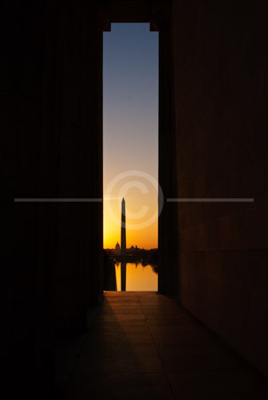 HD_STC-63 - Shot from Lincoln Memorial, Reflecting Pool, Washington Monument, and Capitol seen through columns at sunrise.