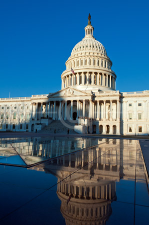 HD_STC-70 - The East Front of the U.S. Capitol Building in Washington, D.C. reflected in the roof glass of the underground visitor's center.