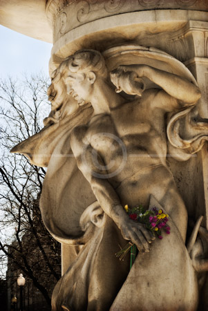 HD_STC-93 - Flowers appear to be held in hand of one of the statues on the Fountain in Dupont Circle, Washingtion, DC