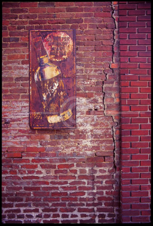 HD_STC-97 - Brick wall and faded sign, Frederick, Maryland.